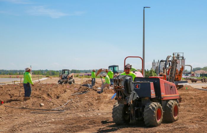 Mill Brothers crew installing irrigation at a Denver-area commercial construction site