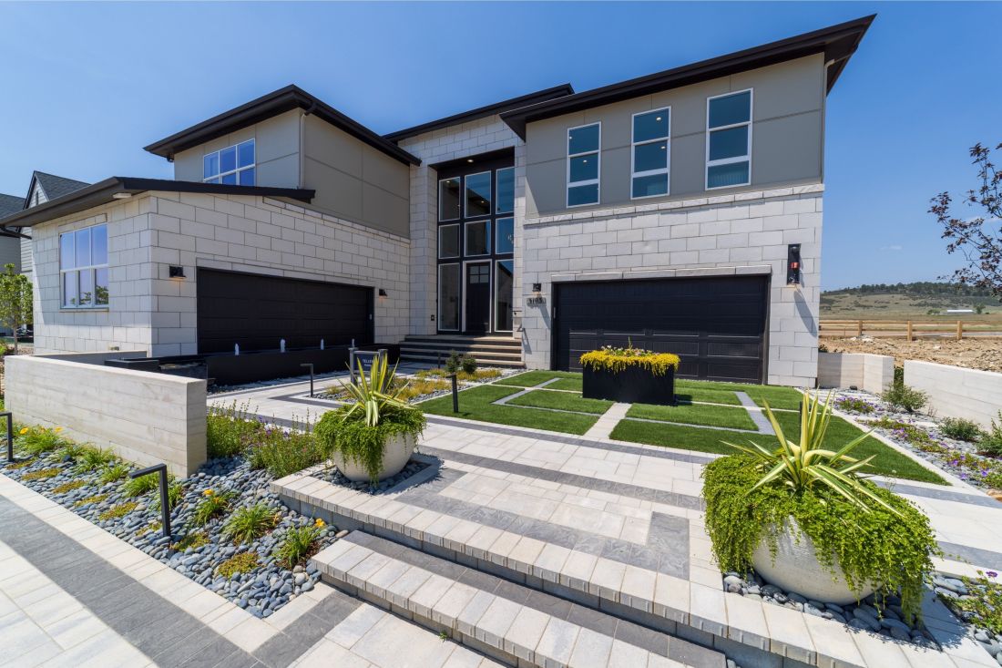 Modern Denver home with paver entry, low-water planting and artificial turf